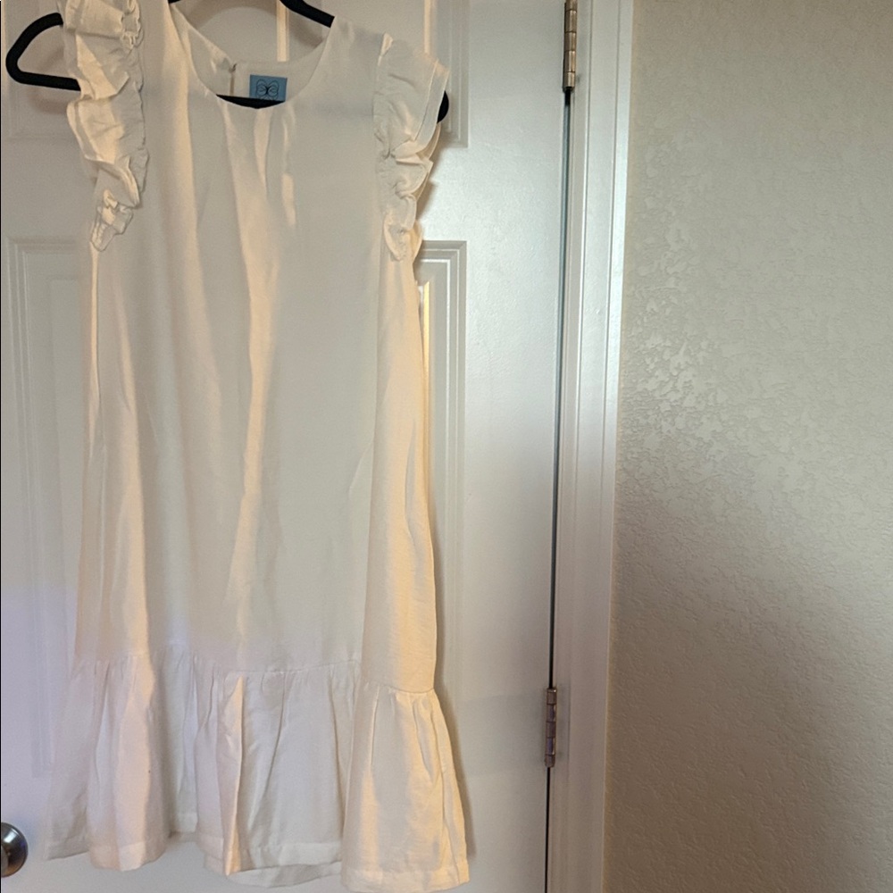 CeCe Cream Sleeveless Dress with Elegant Ruffles